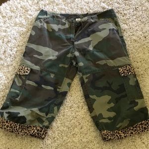 Women camo cargo shorts leopard trim.From Boutique
